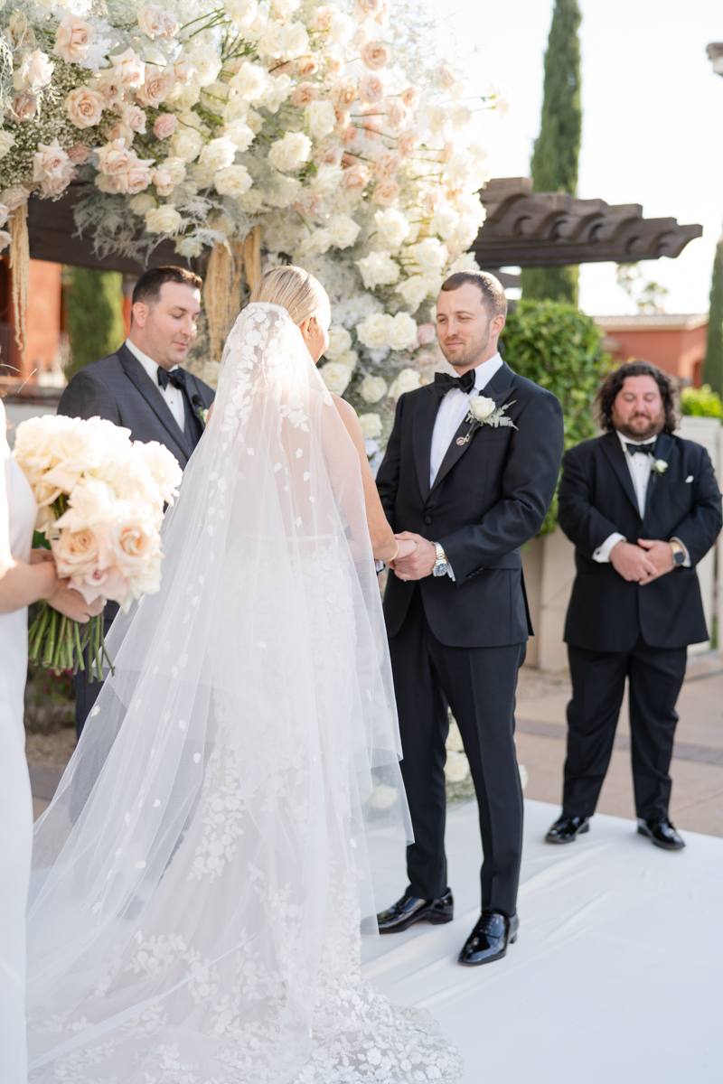 white and pink floral wedding ceremony at omni