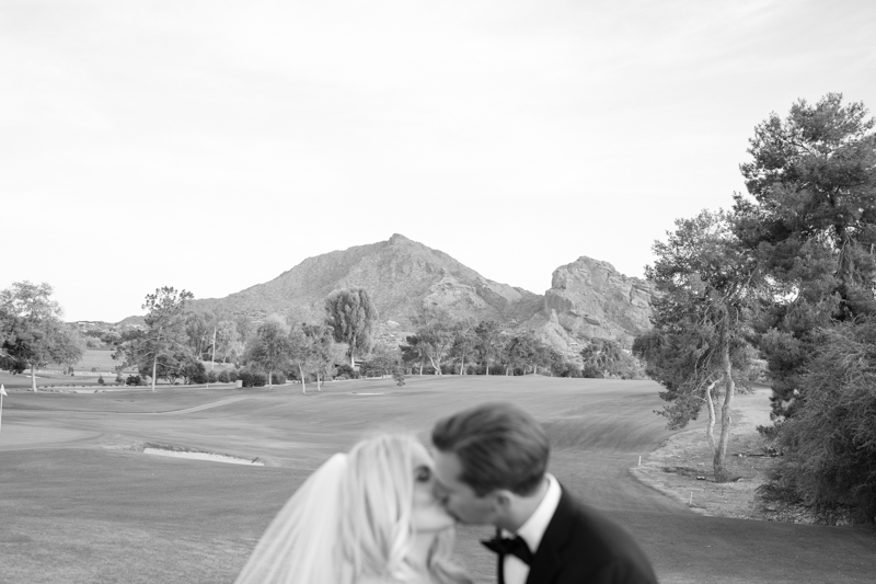 bride and groom photos with camelback mountain backdrop