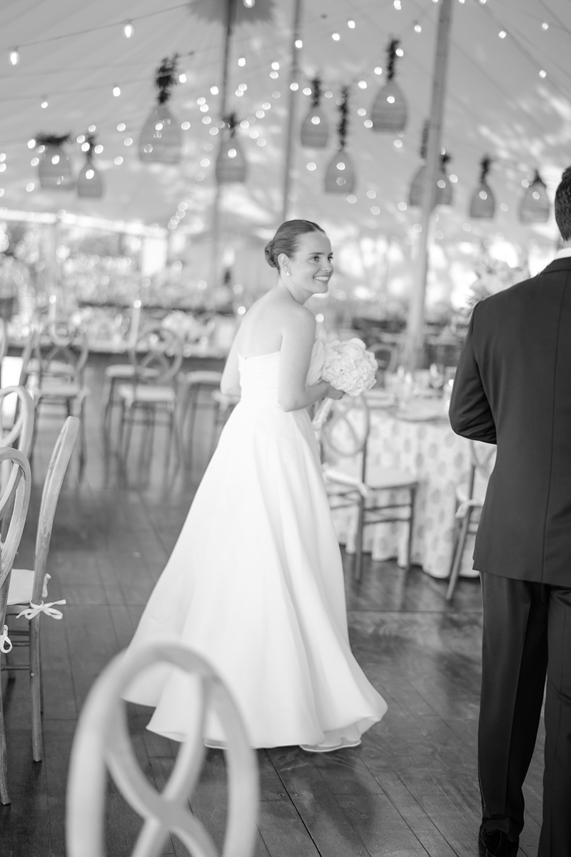 bride and groom seeing tent