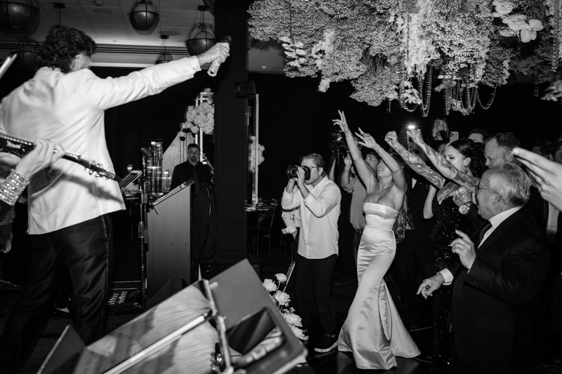 groom singing at wedding