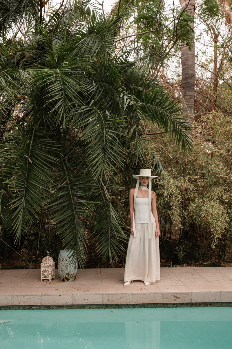 bride by pool